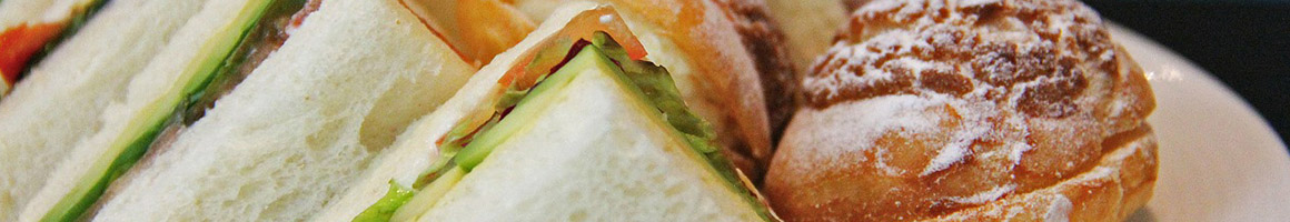 Eating Sandwich at Yello Sub restaurant in Lawrence, KS.